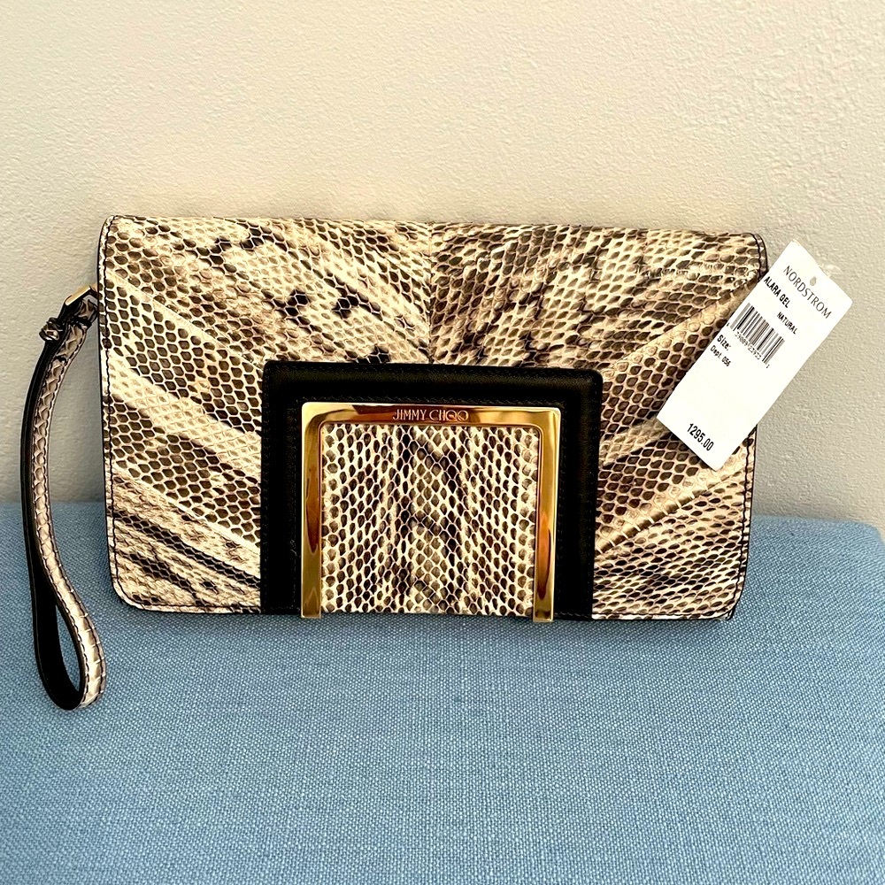 Jimmy Choo wristlet. Brand new, never used!